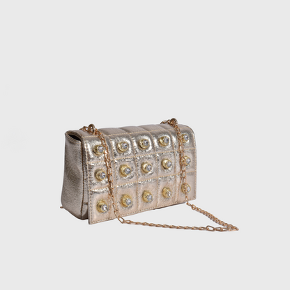 coral quilted shoulder bag with studs